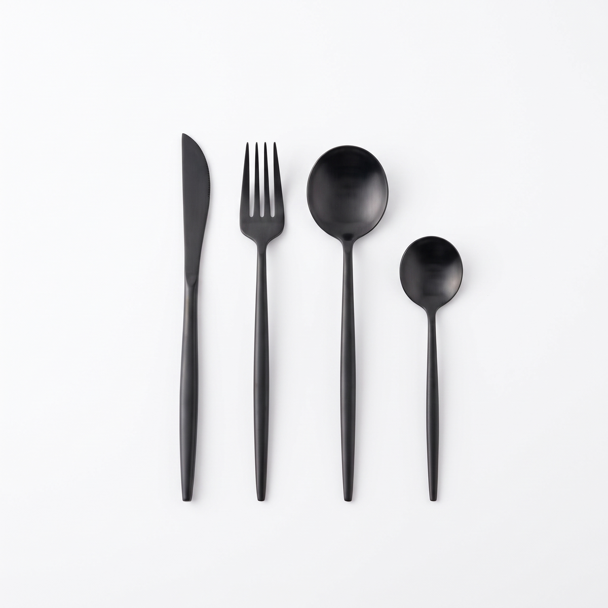 Sevilla cutlery set laid out on white